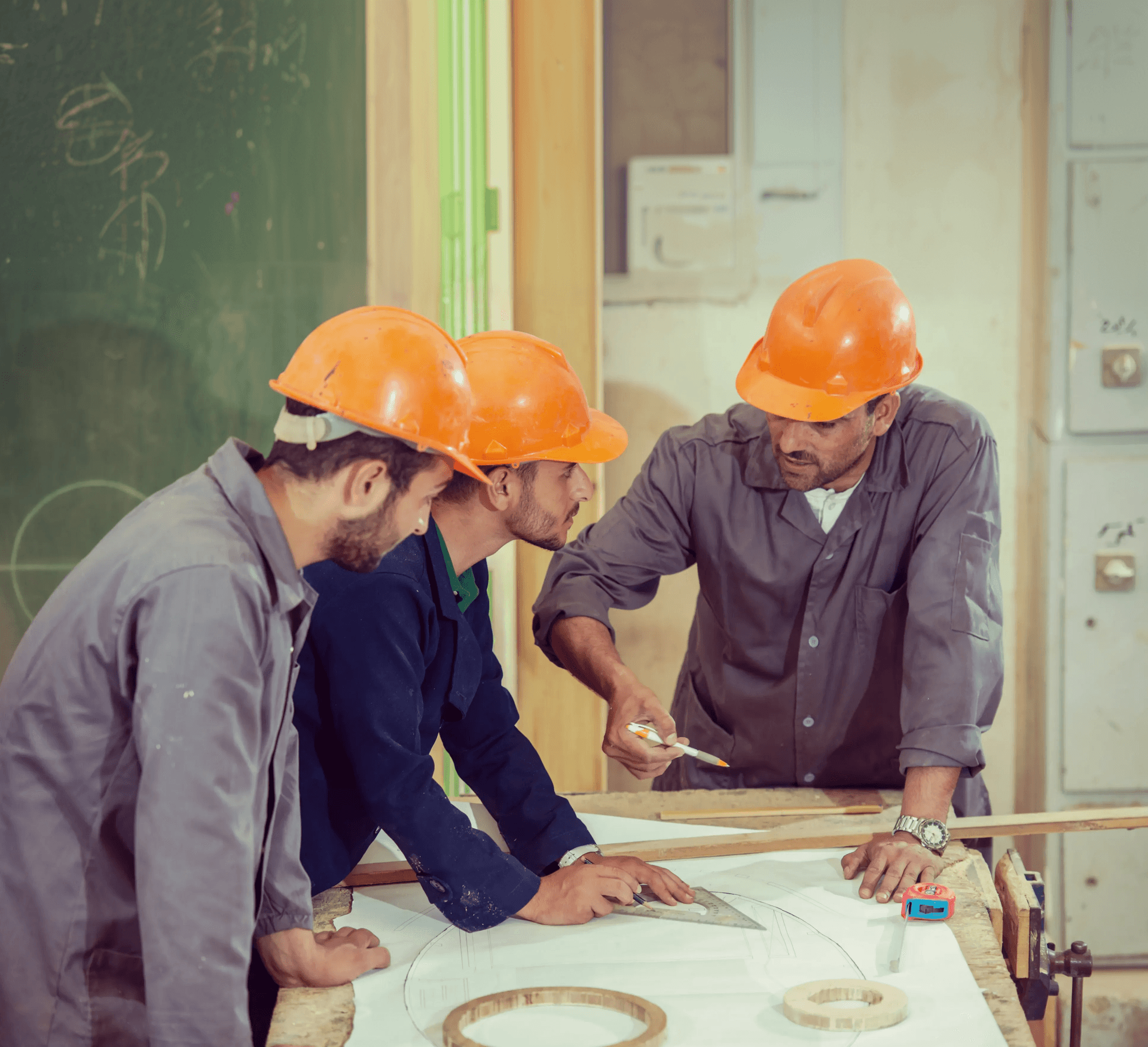 Professional reviewing work on site